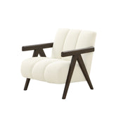 Gothen Armchair upholstered in soft teddy fabric with channeled stitching and ash wood frame, modern design.